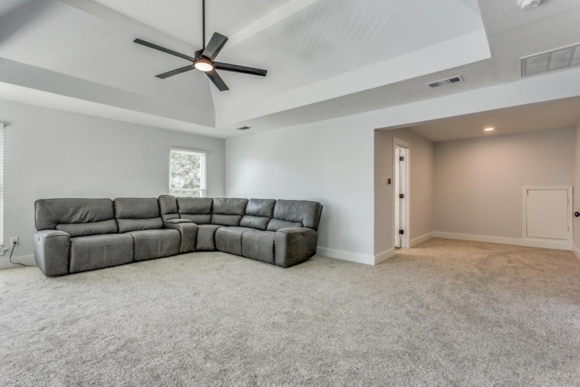 Renovated living room with refreshed paint and updated trim